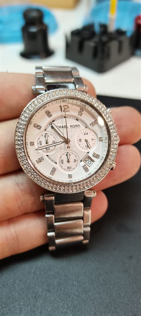 repair michael kors watch